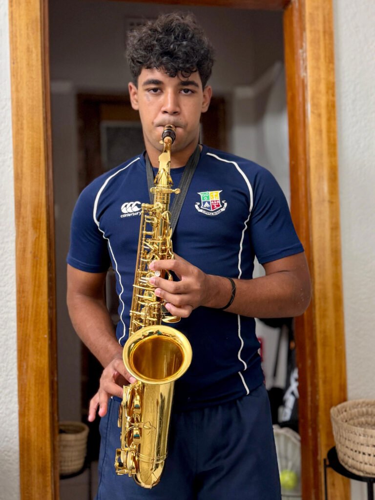 Zac Lewis playing the saxophone